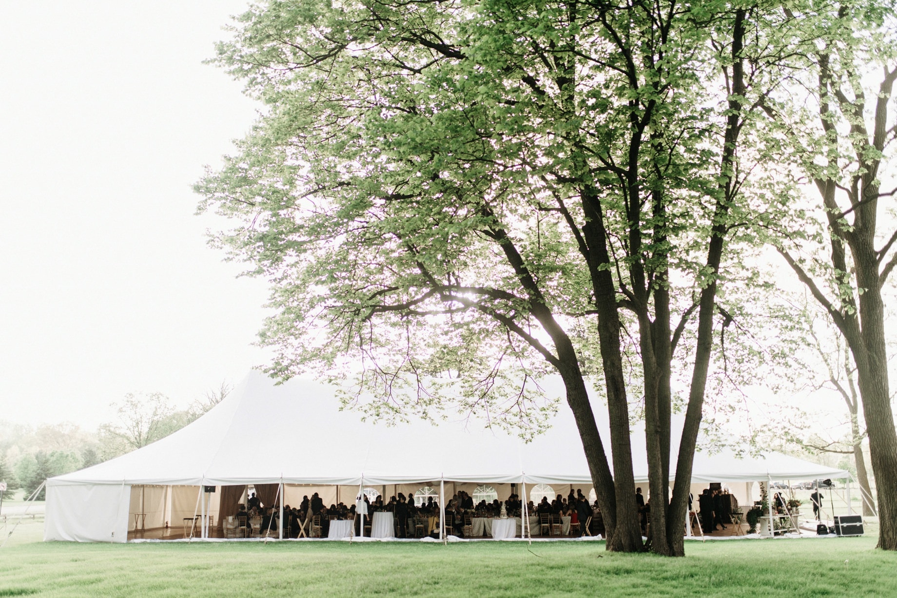 guests enjoying dinner in the tent at cornman farms