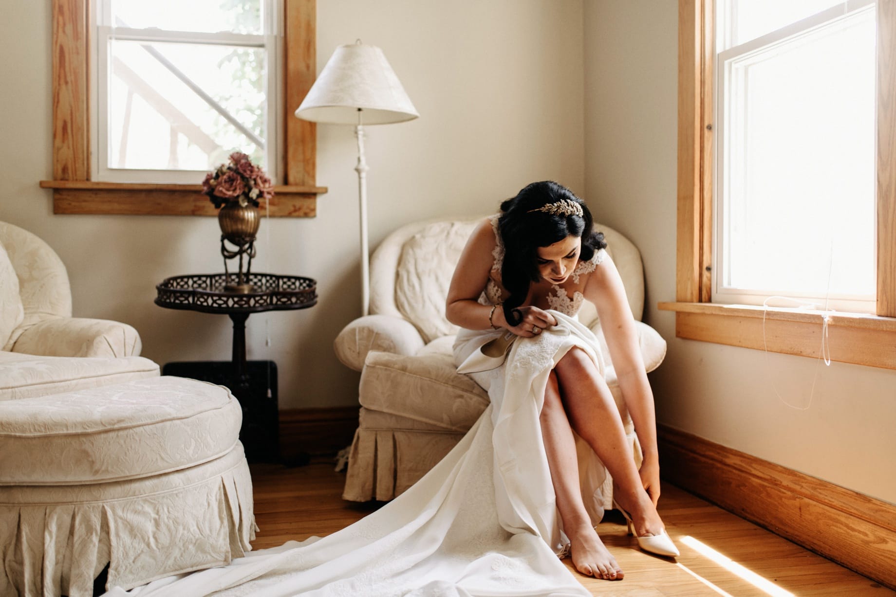 bride putting on shoes