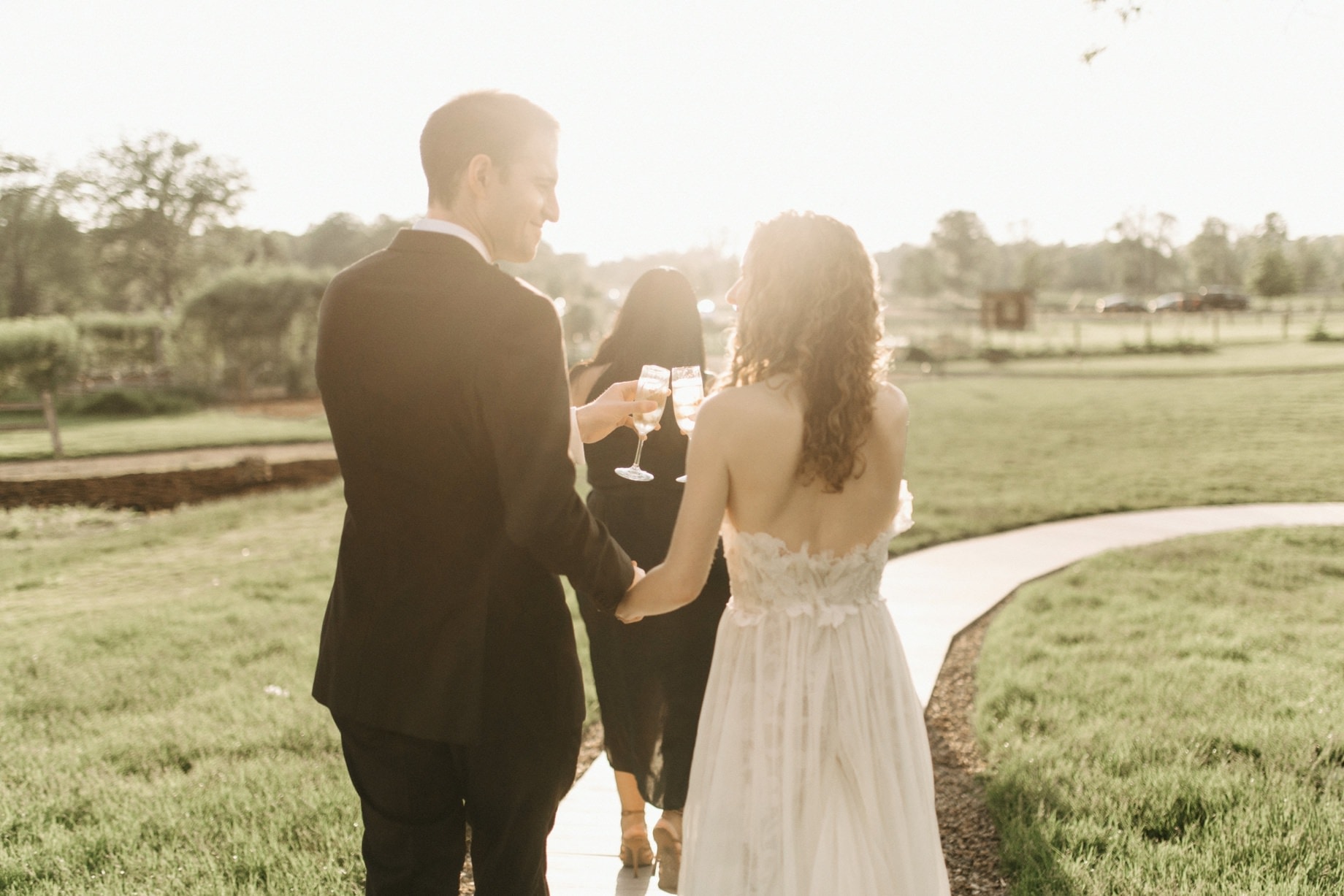 bride and groom toasting