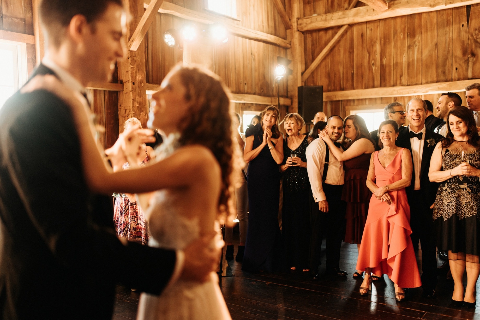 family watching first dance