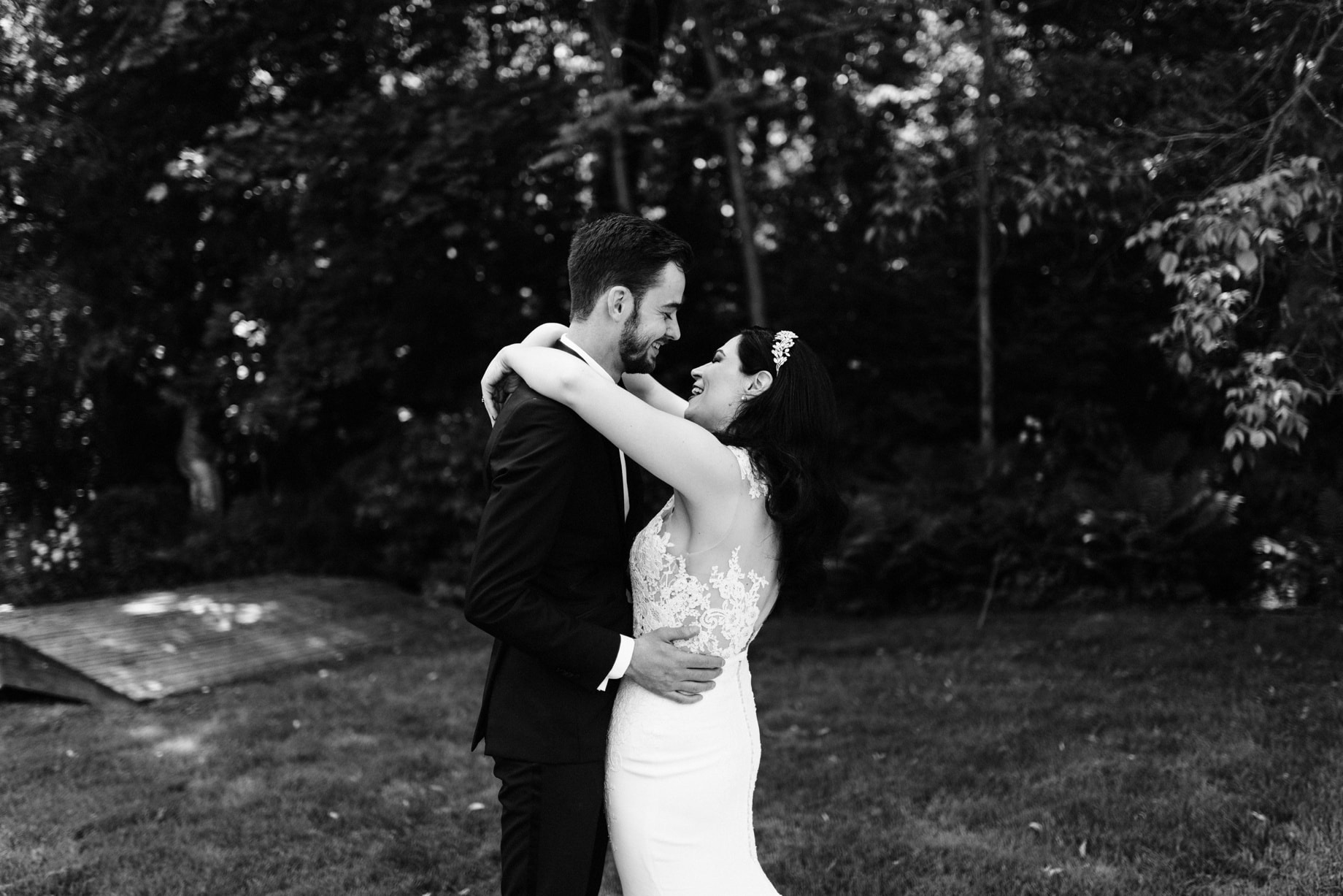 bride and groom sharing a laugh after first look