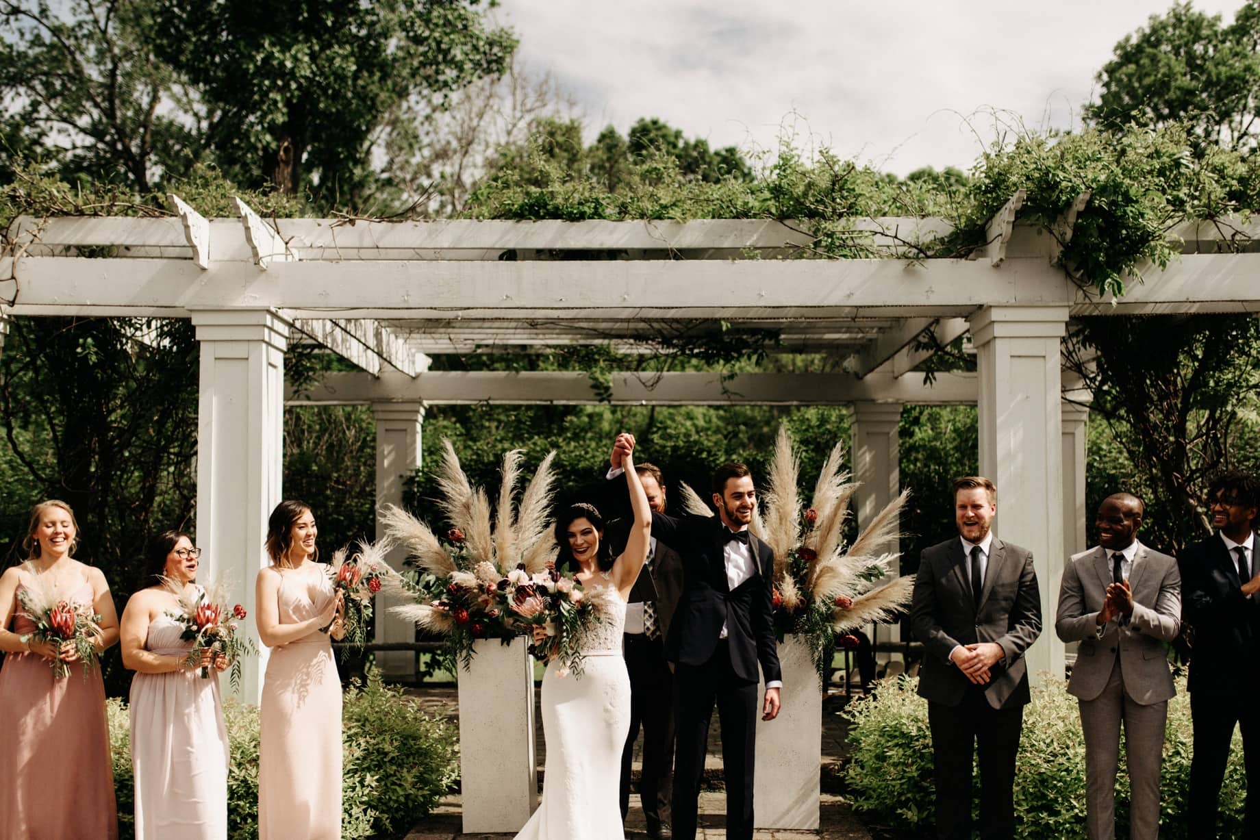 bride and groom celebrate just getting married