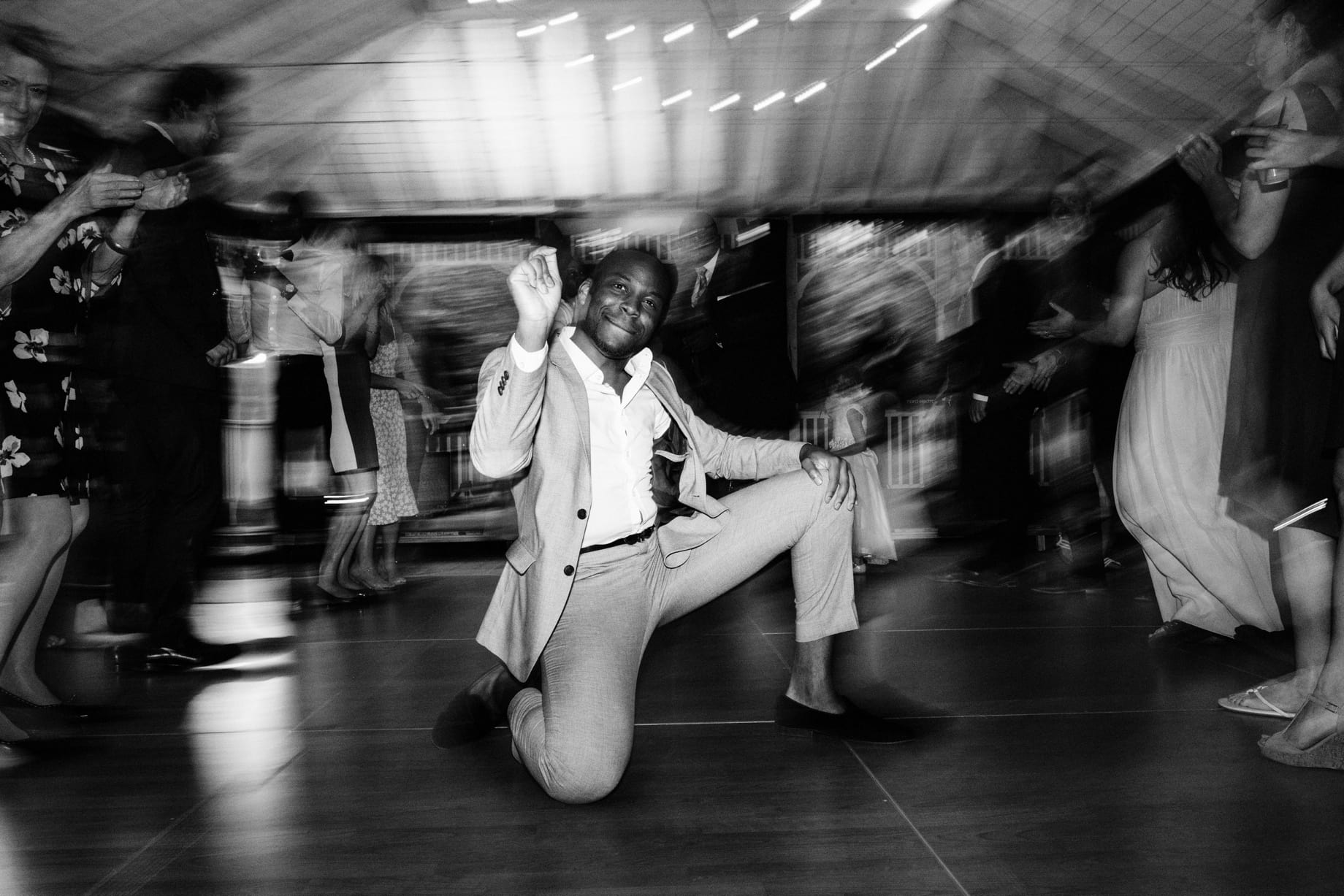 groomsman busting a move at wellers