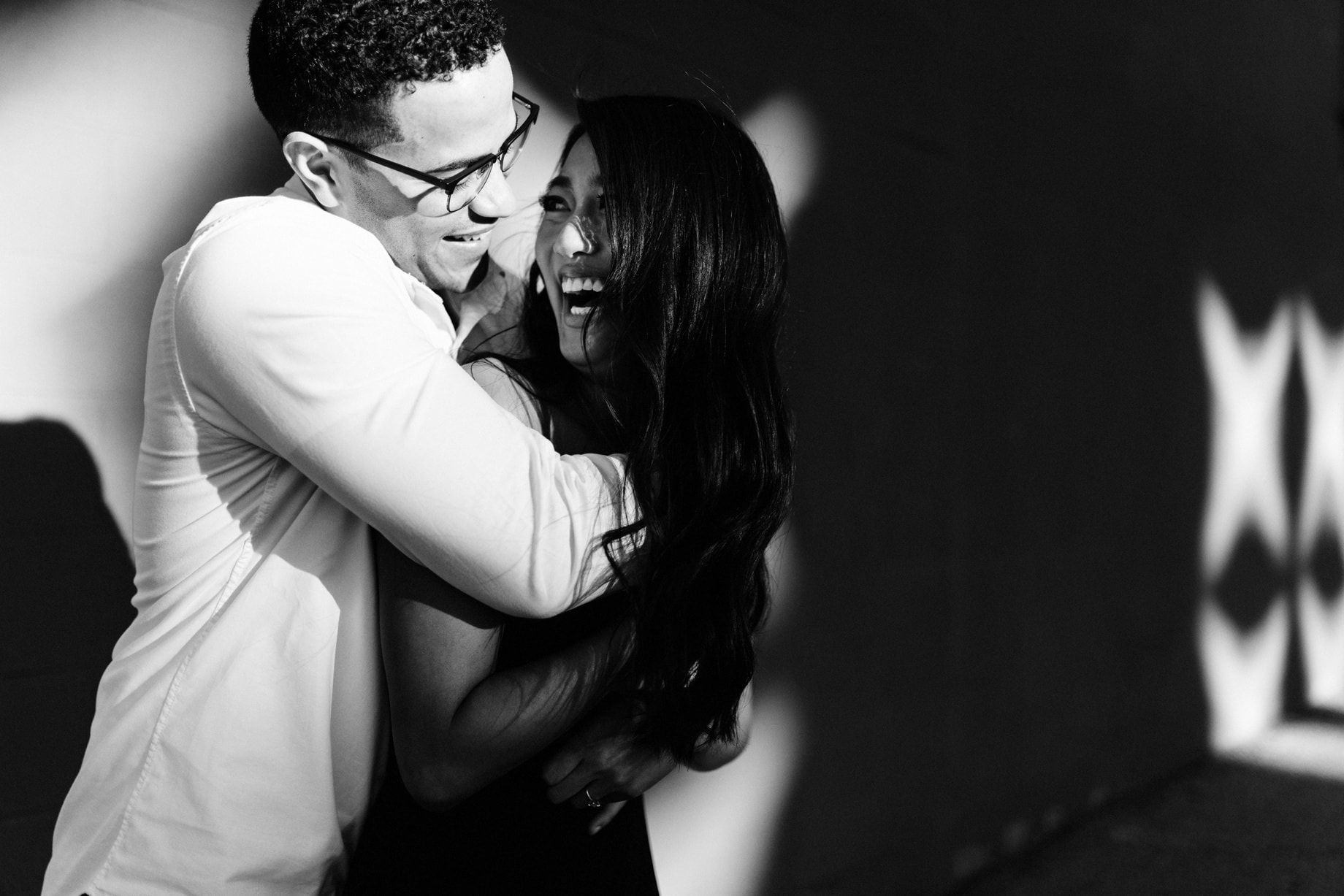 a black and white portrait of a couple during their engagement session in grand rapids