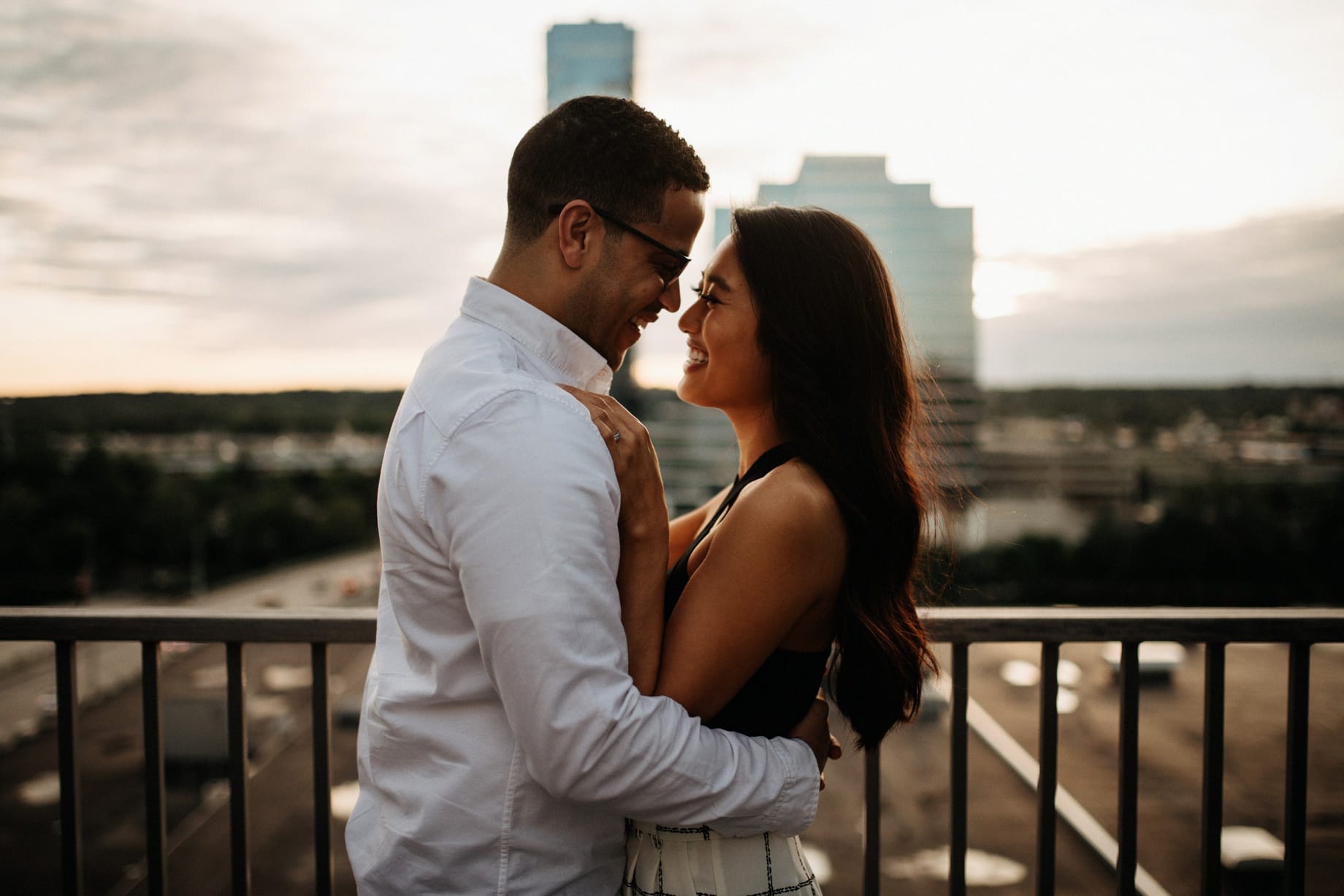 golden hour engagement photos on a rooftop