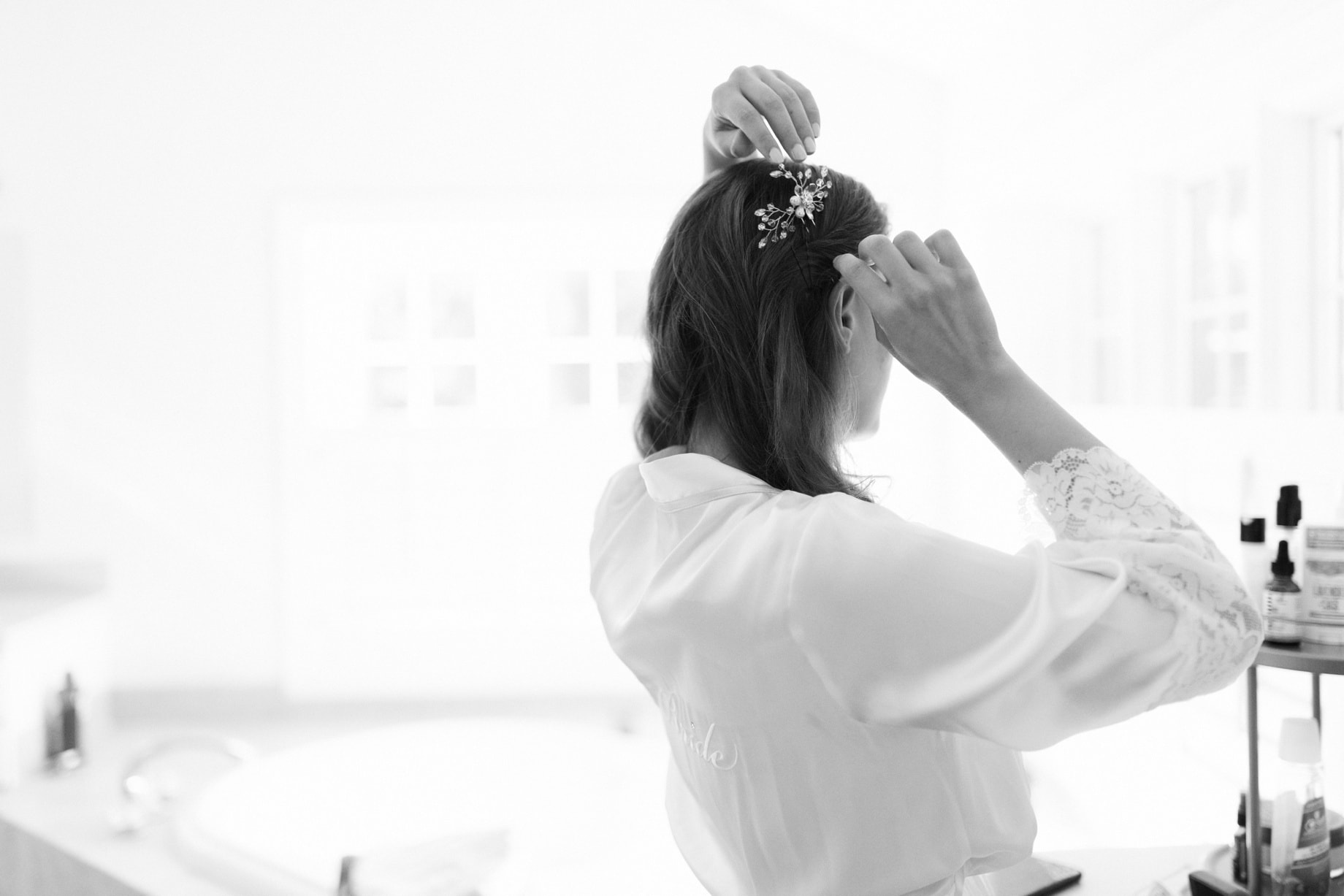 Bride adjusting a hair comb