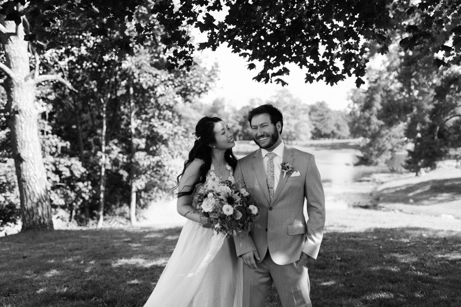 happy couple on their wedding day photojournalistic Detroit wedding photographer Heather Jowett