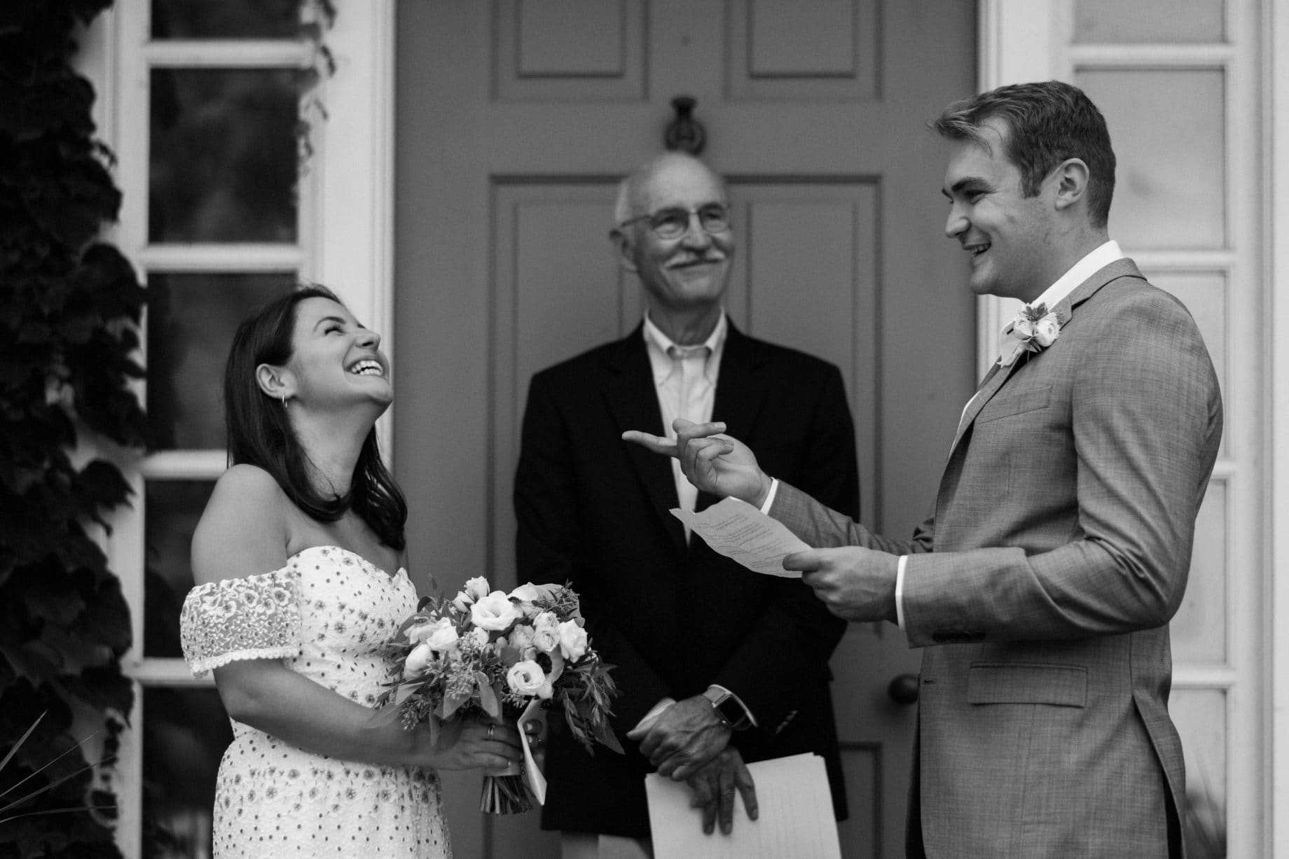 laughs shared during a wedding ceremony by photojournalistic Detroit wedding photographer Heather Jowett