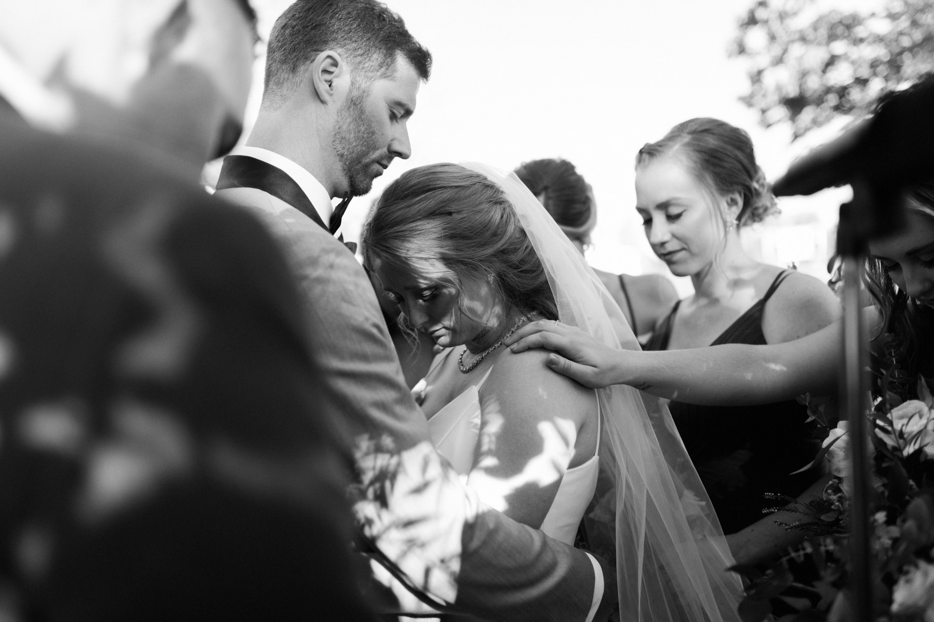 a couple is prayed for during their wedding ceremony