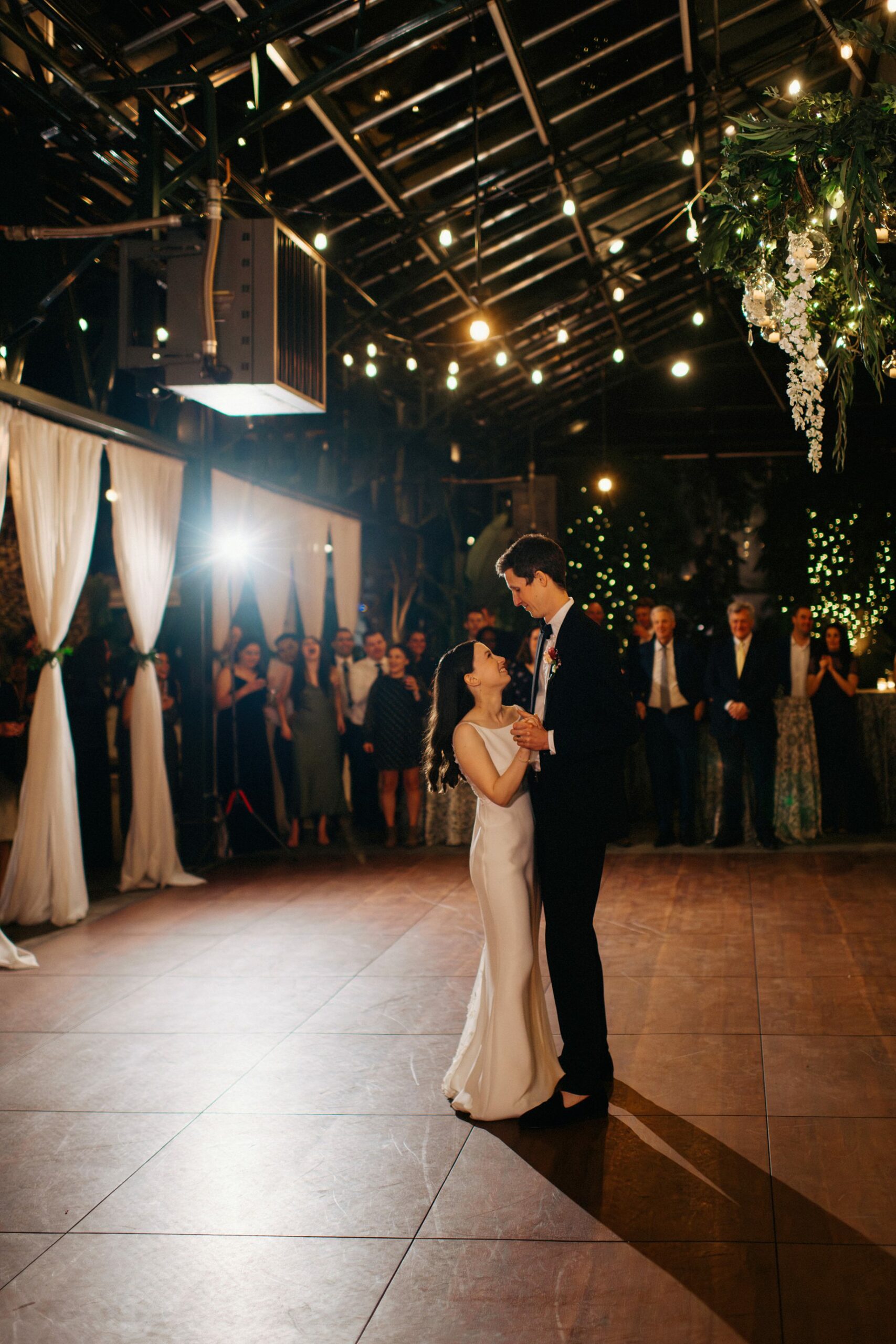 first dance under the glowing lights in the greenhouse at Planterra 1