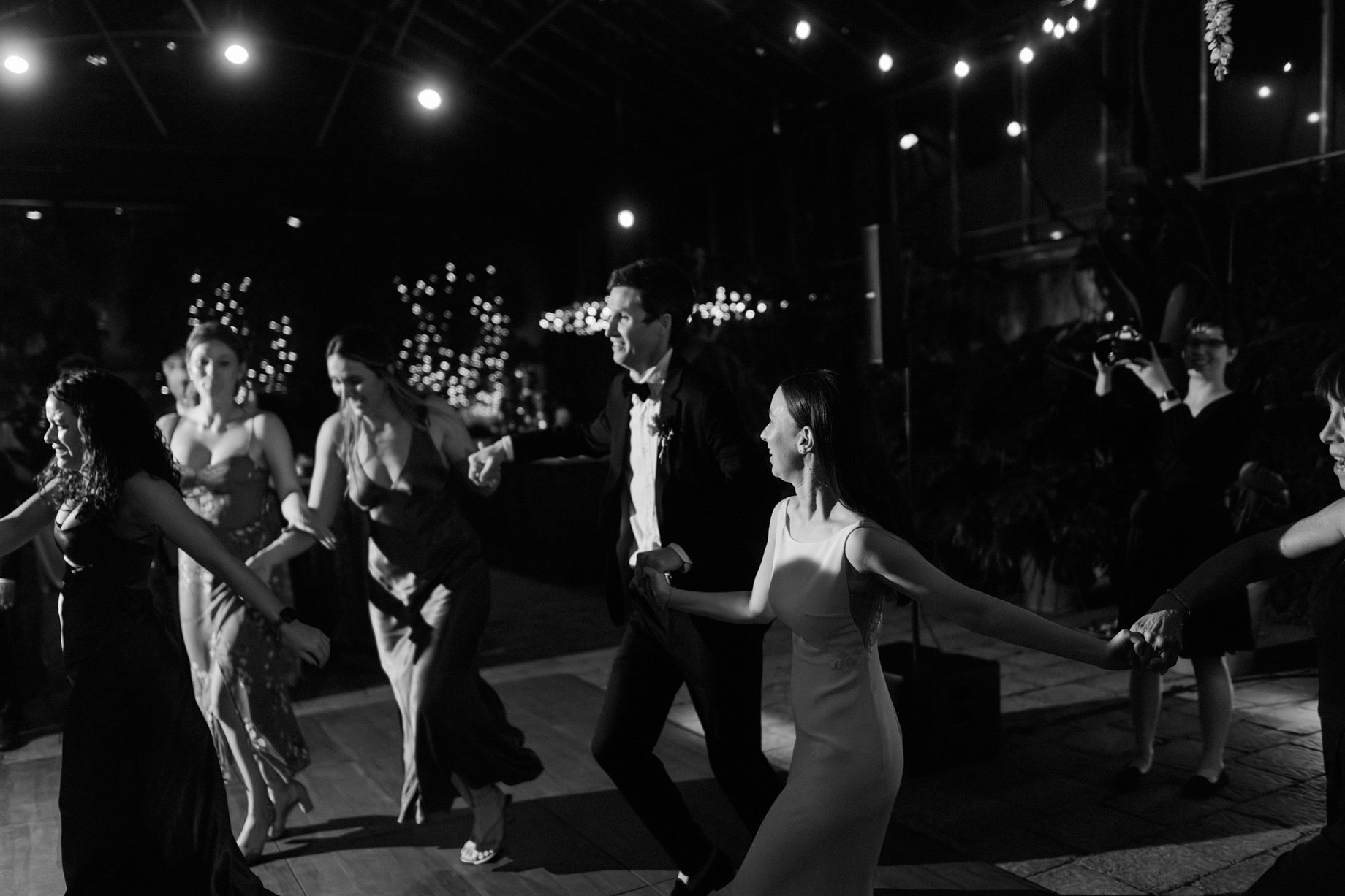 bride and groom dancing the hora 1