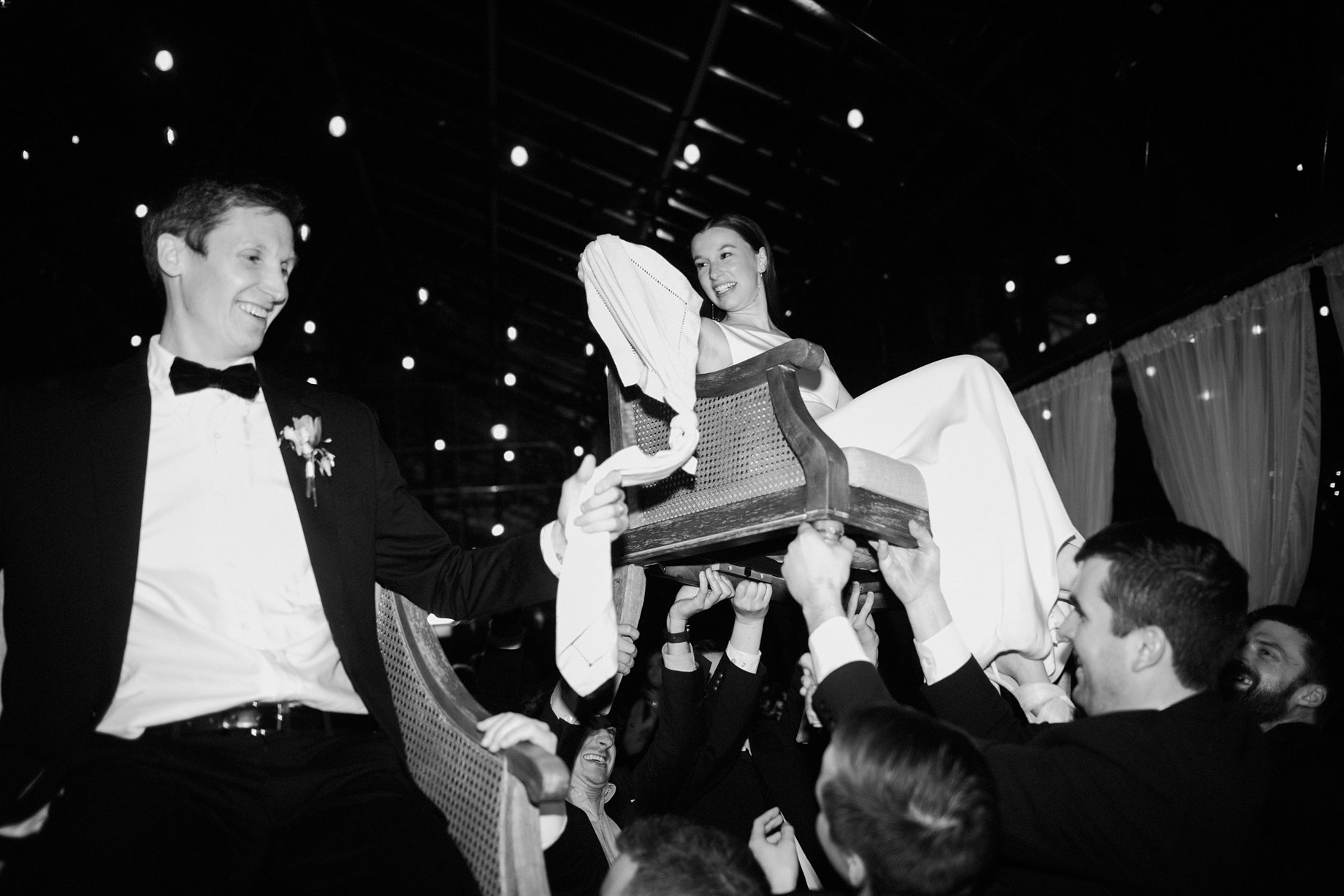 bride and groom dancing the hora 1