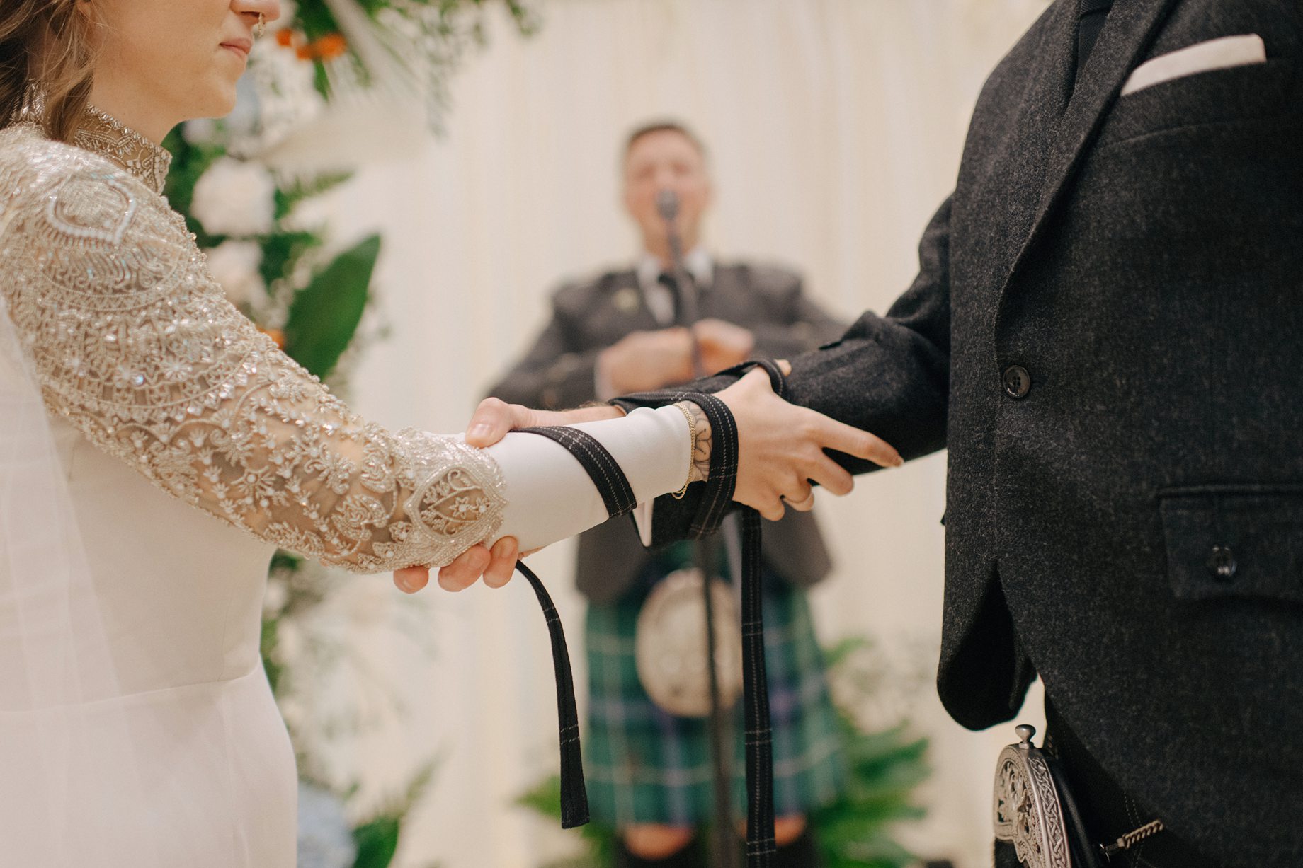 a handfasting ceremony to honor the couples love for scotland