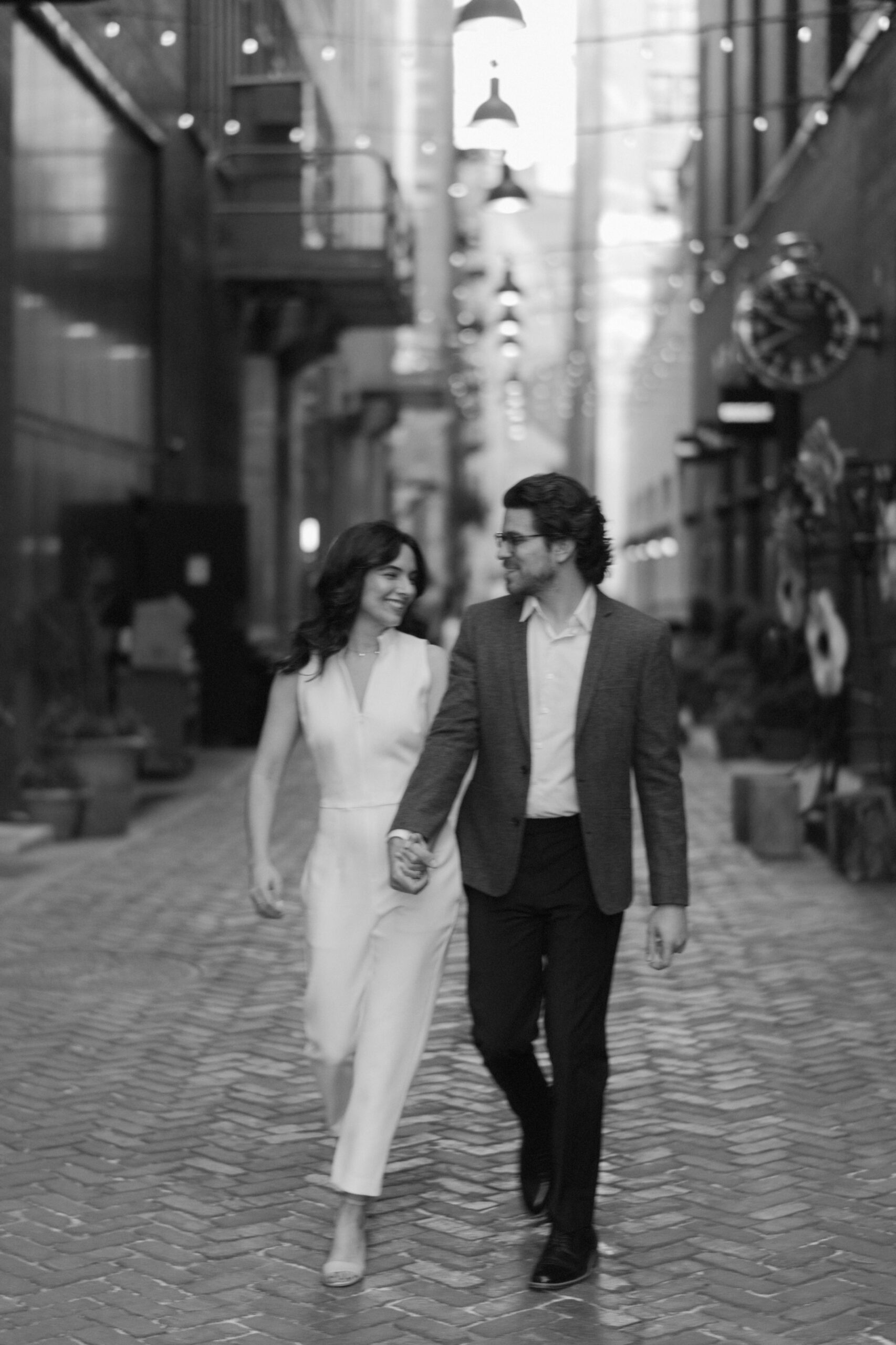 A couple walking down parker's alley in detroit