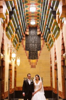 Bride and groom in the guardian building