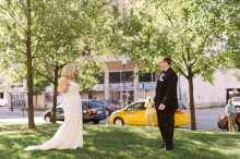 Bride and groom share a first look in Detroit before their wedding at the Gem Theater by wedding photographer Heather Jowett.