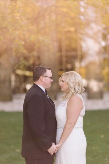 Bride and groom photographed outside the Detroit Public Library by wedding photographer Heather Jowett.