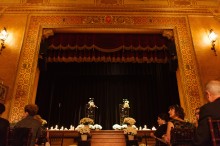 the stage of the Gem Theater in Detroit set up for a wedding.