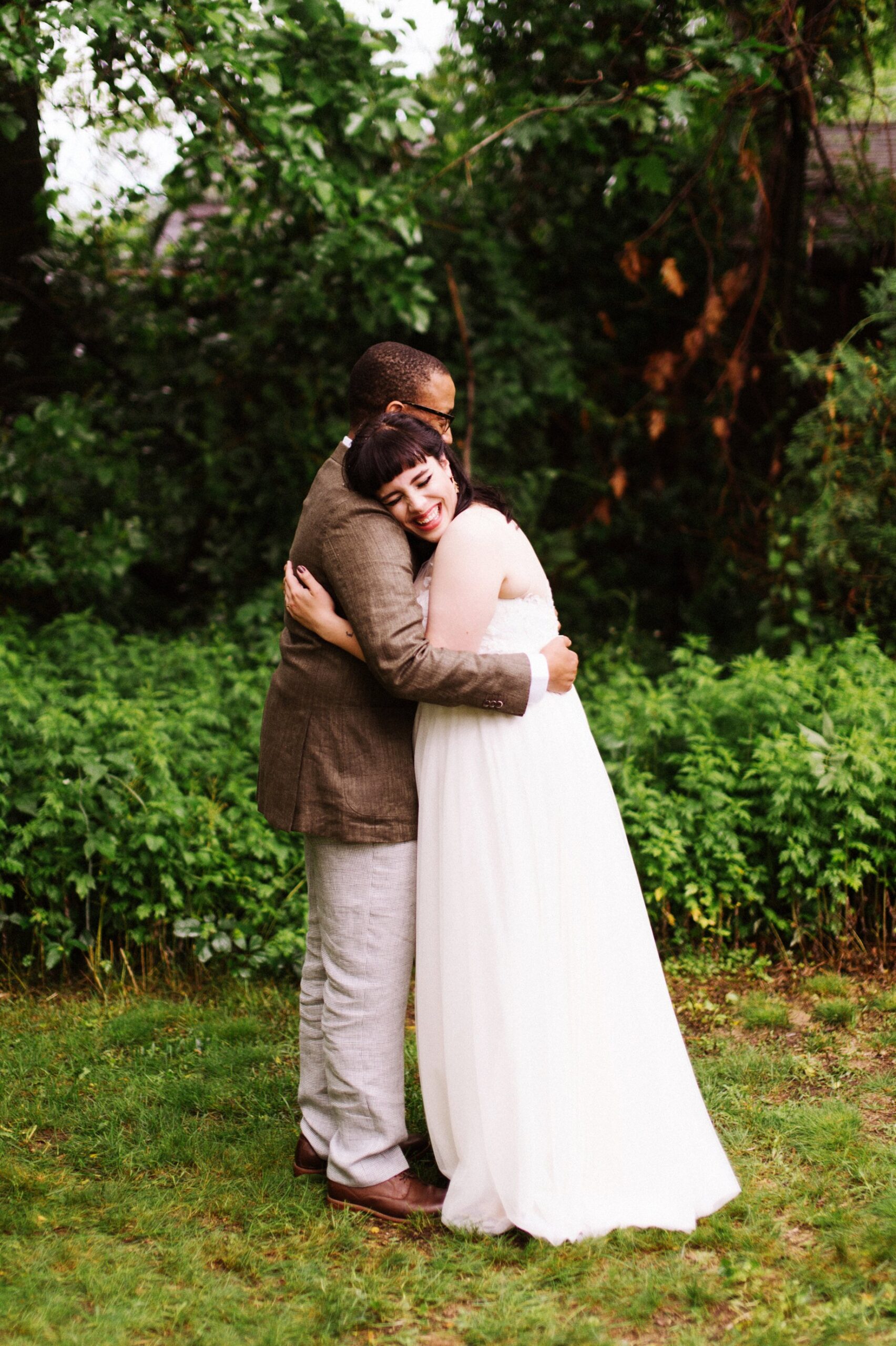 bride and groom embrace