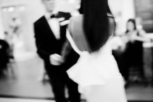 artistic wedding photograph of bride and groom dancing