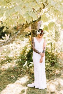bride with bhldn dress and flower crown