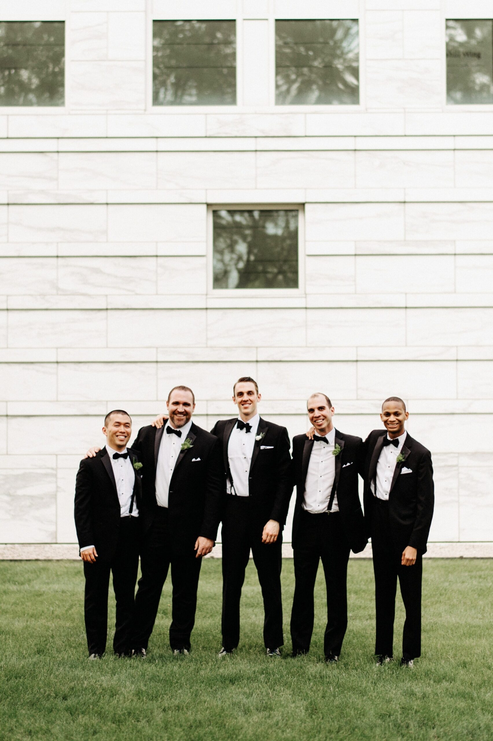 groomsmen in tuxedos