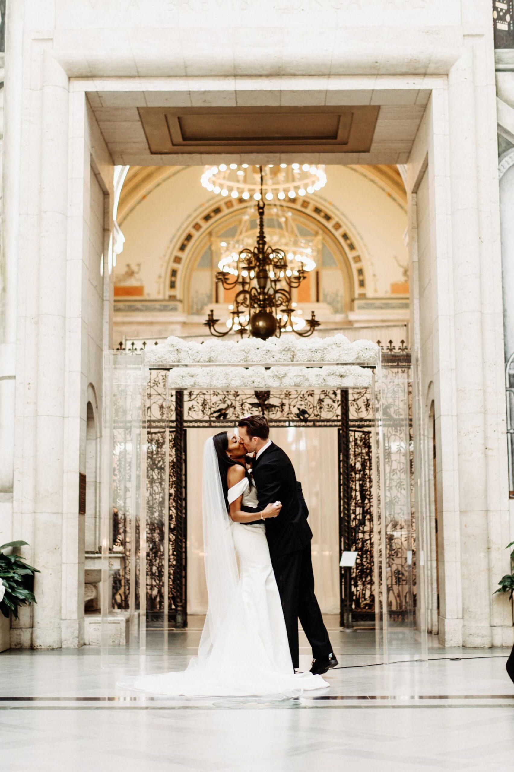 couple exchanging first kiss in rivera court