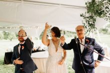 bride and groom toasting