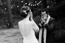 both bride and groom having emotional reaction to their first look