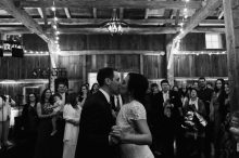 ending their first dance with a kiss