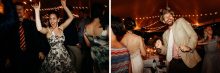 guests dance under string lights at a wedding