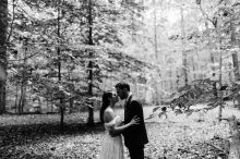 bride and groom pose for portraits in the woods at Prince William Forest Park