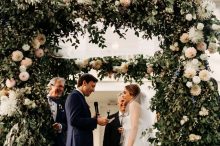 groom shares vows with his bride during a jewish wedding at cornman farms