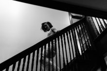 bride walking down the stairs to her first look
