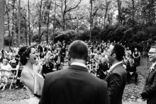 couple bursting into laughter during their wedding ceremony