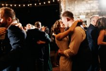 bride and groom at a winter wedding at the Jam Handy by Detroit wedding photographer Heather Jowett