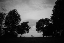 scenic portrait of a couple on the coast of lake huron