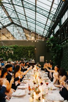 bride and groom toasting at their Planterra Conservatory Wedding by wedding photographer Heather Jowett