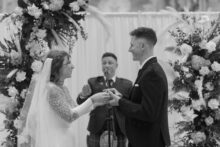 bride and groom exchange a drink from a quaich a traditional two handled cup used in scottish weddings