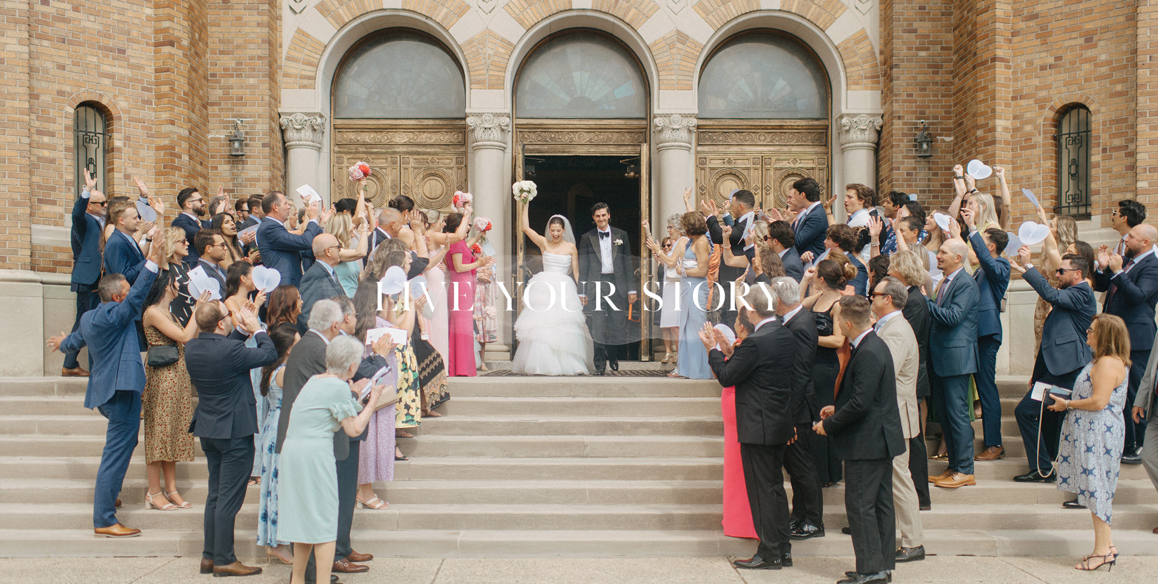 Bride and groom leaving the church after the ceremony to a crowd of cheering guests.