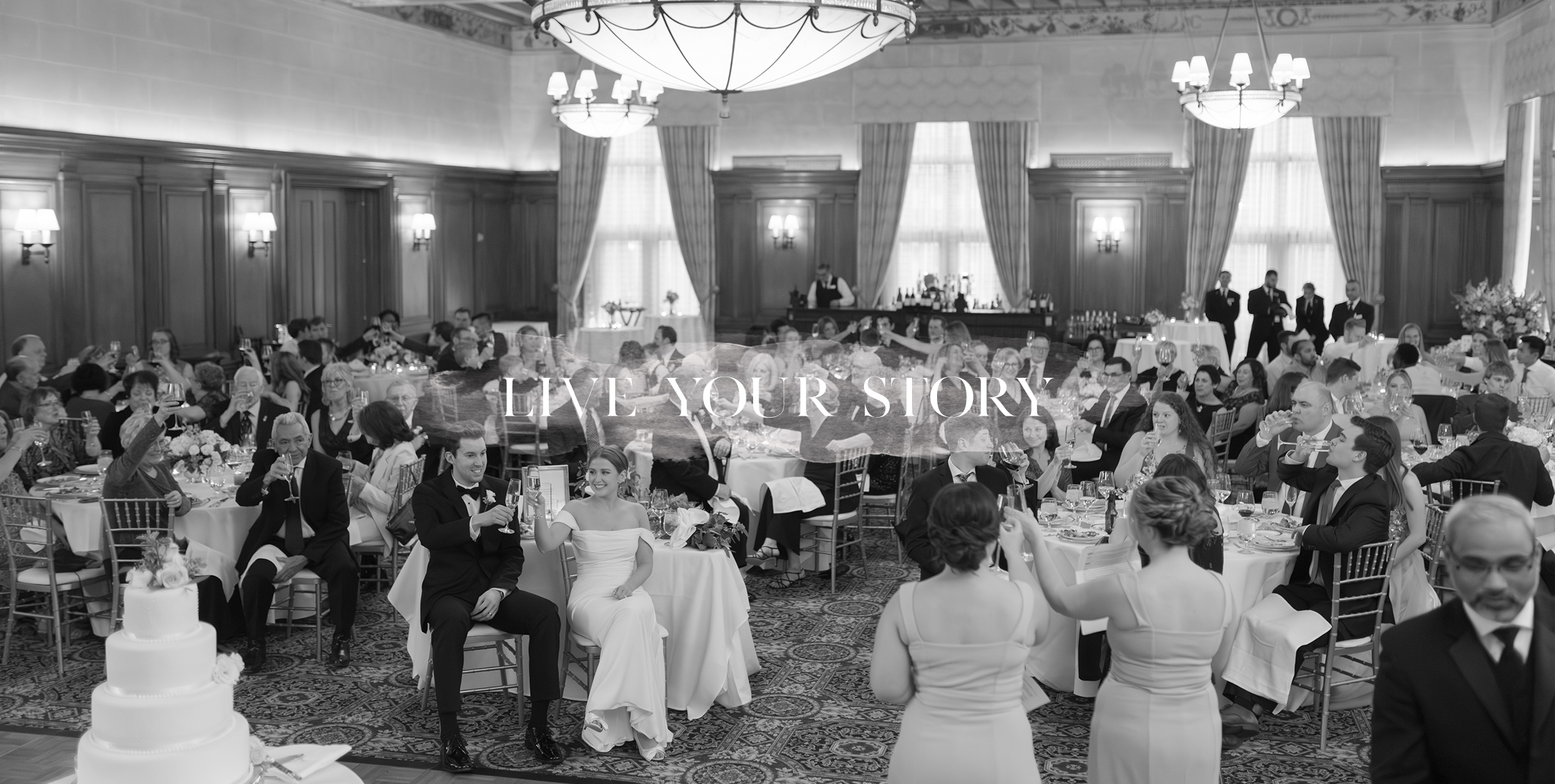 Black and white photograph of a bride and groom toasting in the Detroit Athletic Club.