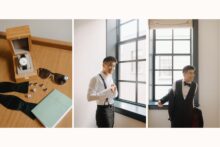 Groom laughs while getting ready near a window at the Shinola Hotel in Detroit.