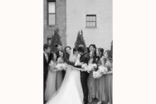 Bride and groom with their wedding party at the Shinola Hotel.