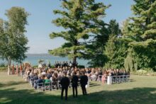 Wide view of a Bay View Michigan wedding ceremony held at a family home
