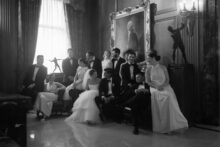 Bridesmaids and groomsmen photographed in a refined editorial wedding style in the lobby of the DAC