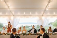 Emotional wedding toasts at the Perry Hotel photographed with an editorial documentary approach